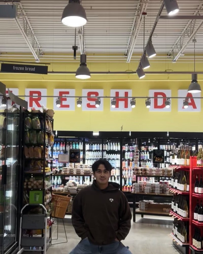 Emilio in a grocery aisle
